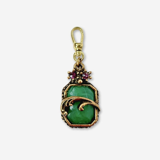 Vintage green cabochon charm in antique brass setting