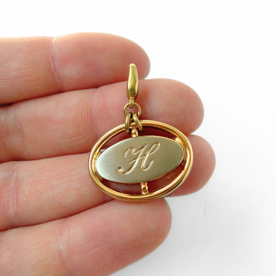 Vintage mixed metal oval "H" monogram charm