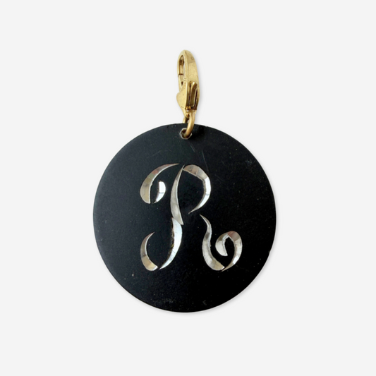 Large vintage black matte circular "R" monogram charm