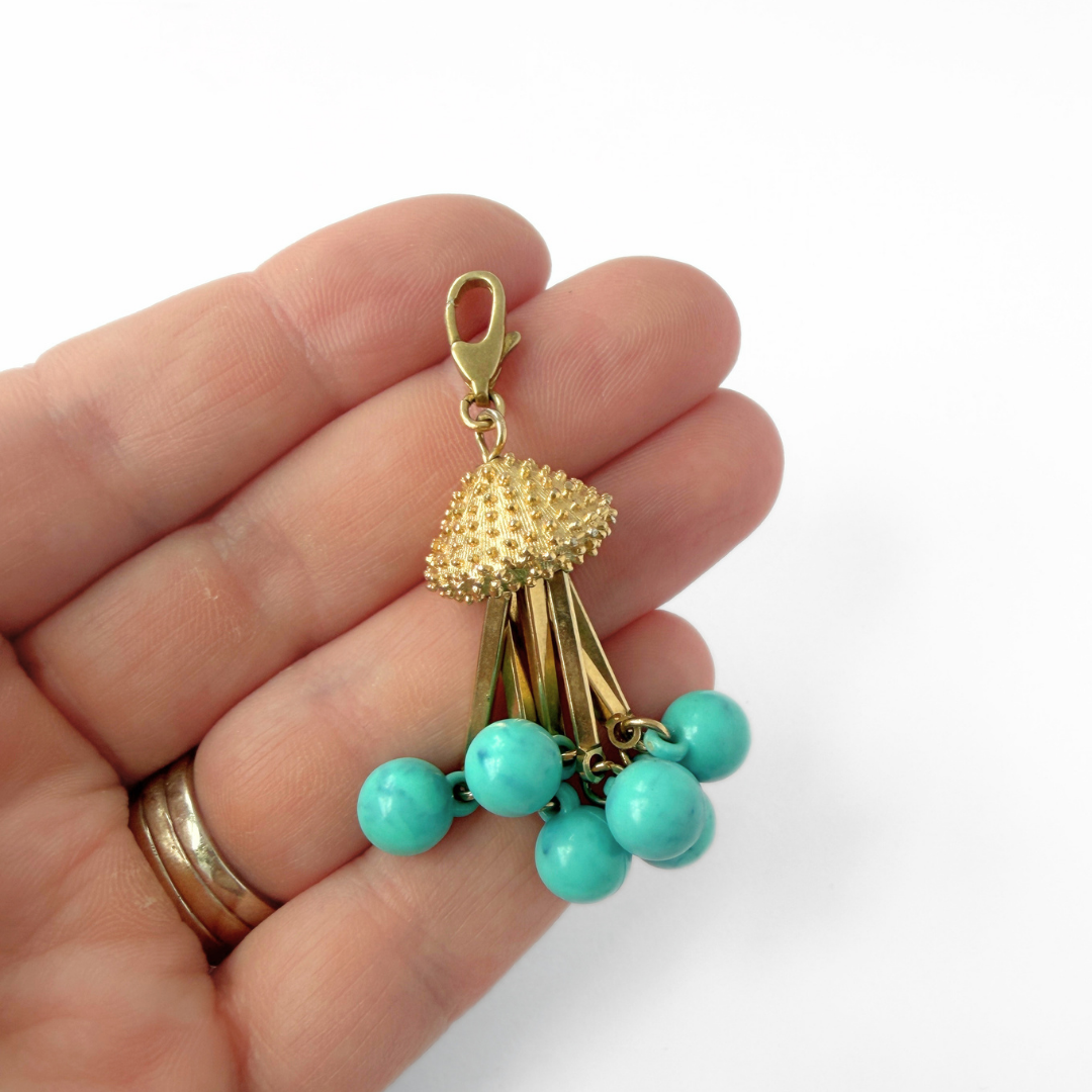 Vintage gold tone tassel charm with turquoise bead drops
