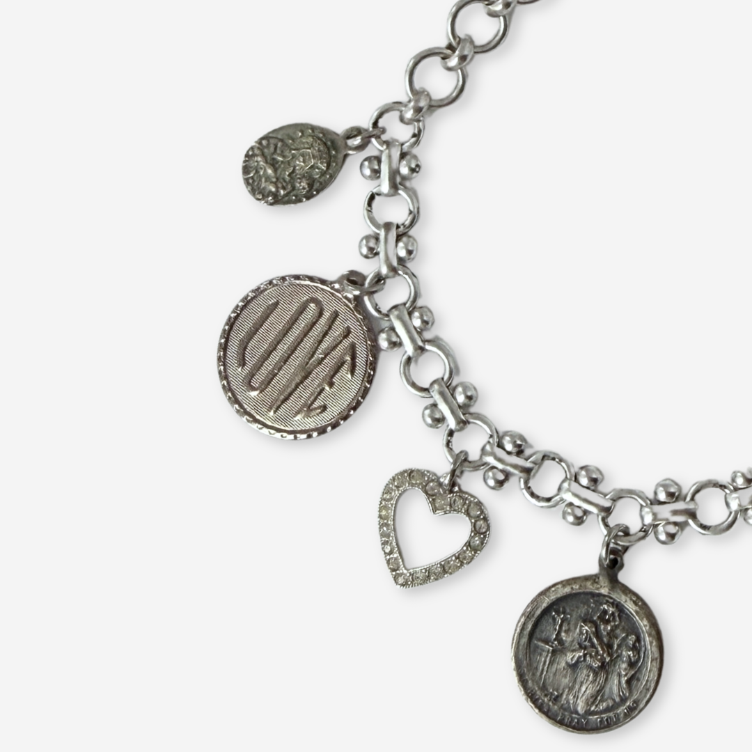 Repurposed vintage mixed silver religious charm bracelet