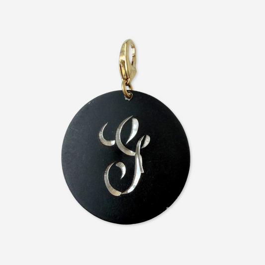 Large vintage black matte circular "G" monogram charm