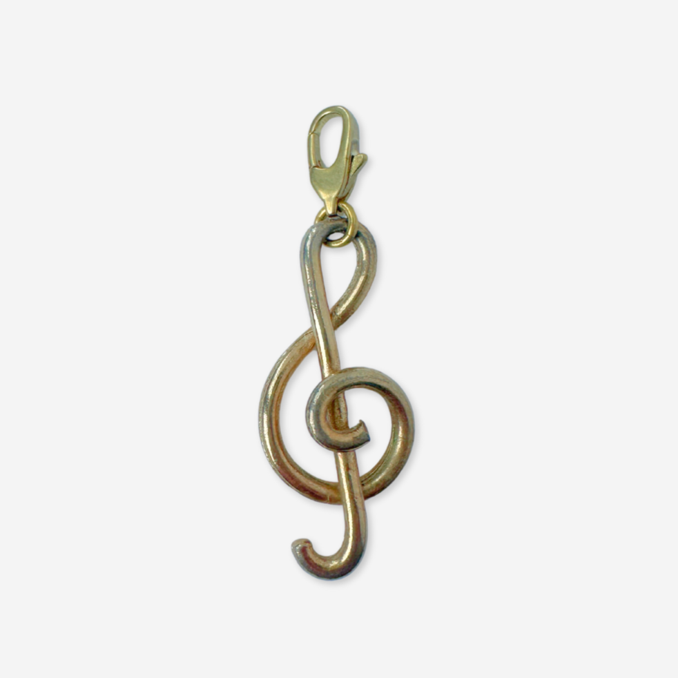Vintage muted gold treble clef charm pendant