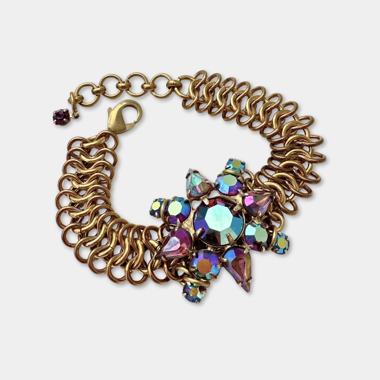 Vintage aurora borealis purple rhinestone bracelet with wide brass chain