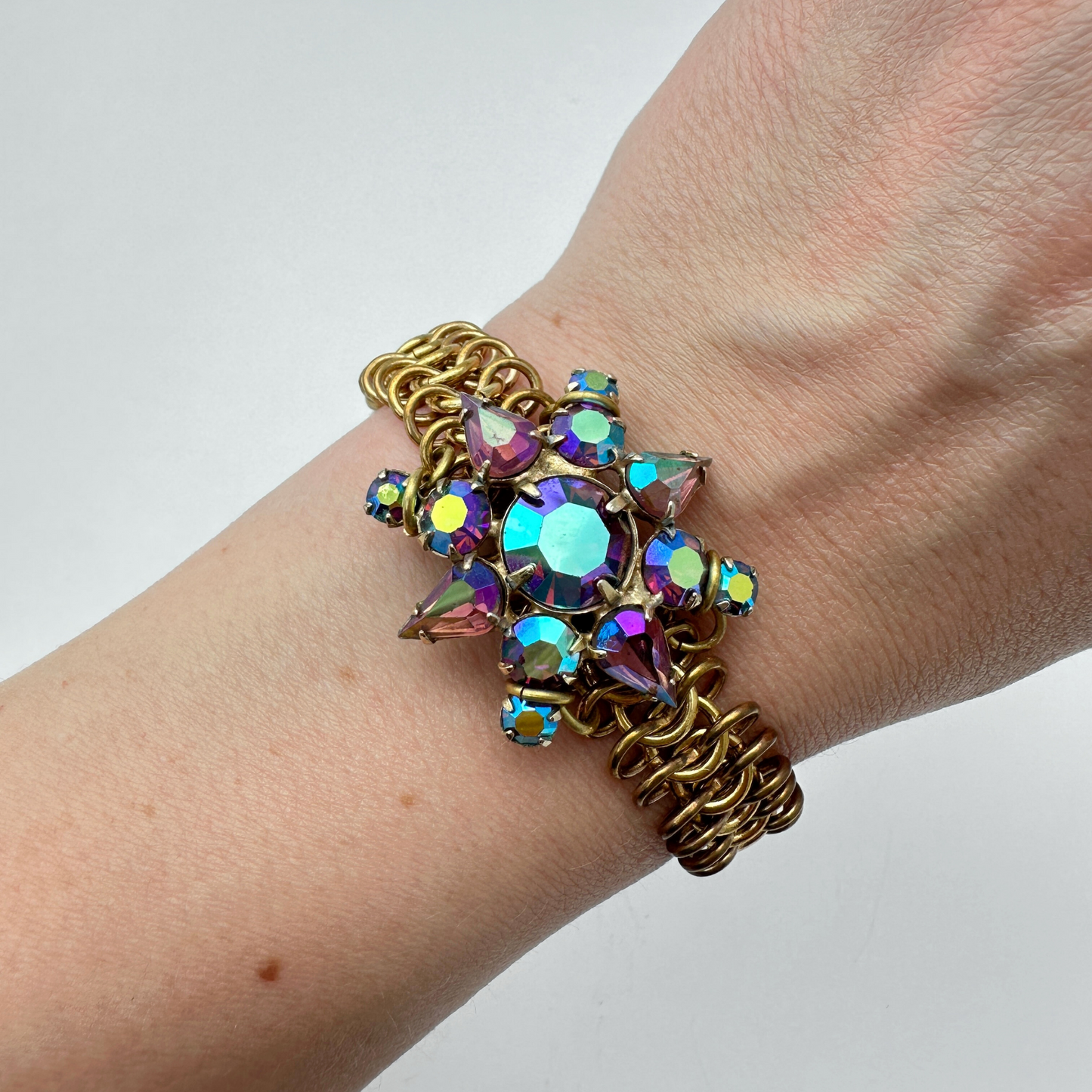 Vintage aurora borealis purple rhinestone bracelet with wide brass chain