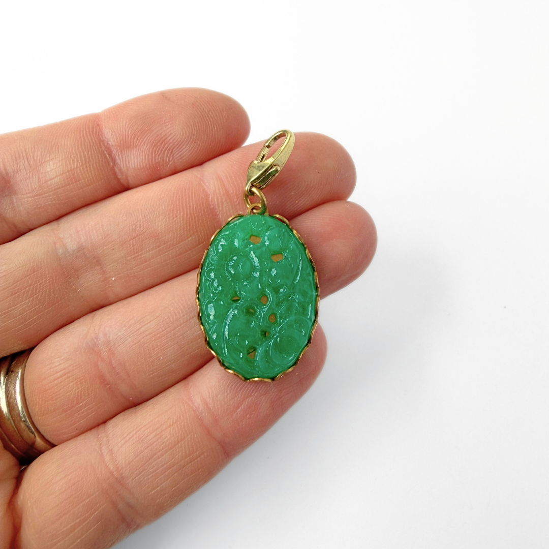 Vintage pressed green glass jade oval charm