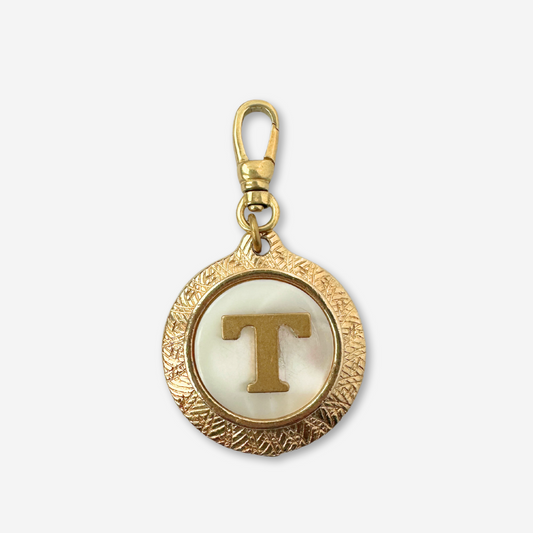 Large vintage mother of pearl and brass "T" circle charm