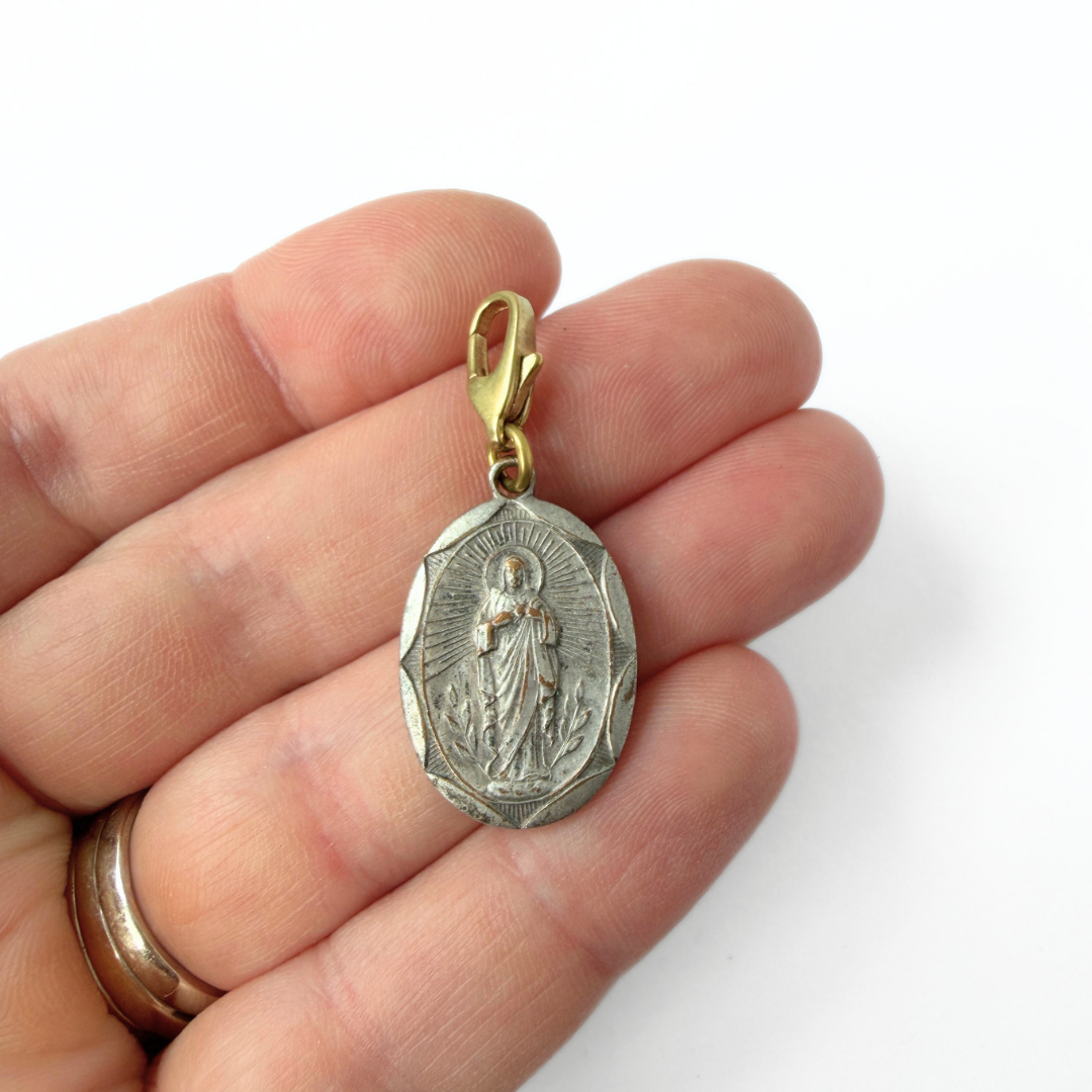 Vintage aged silver Lady of Mt. Carmel oval charm
