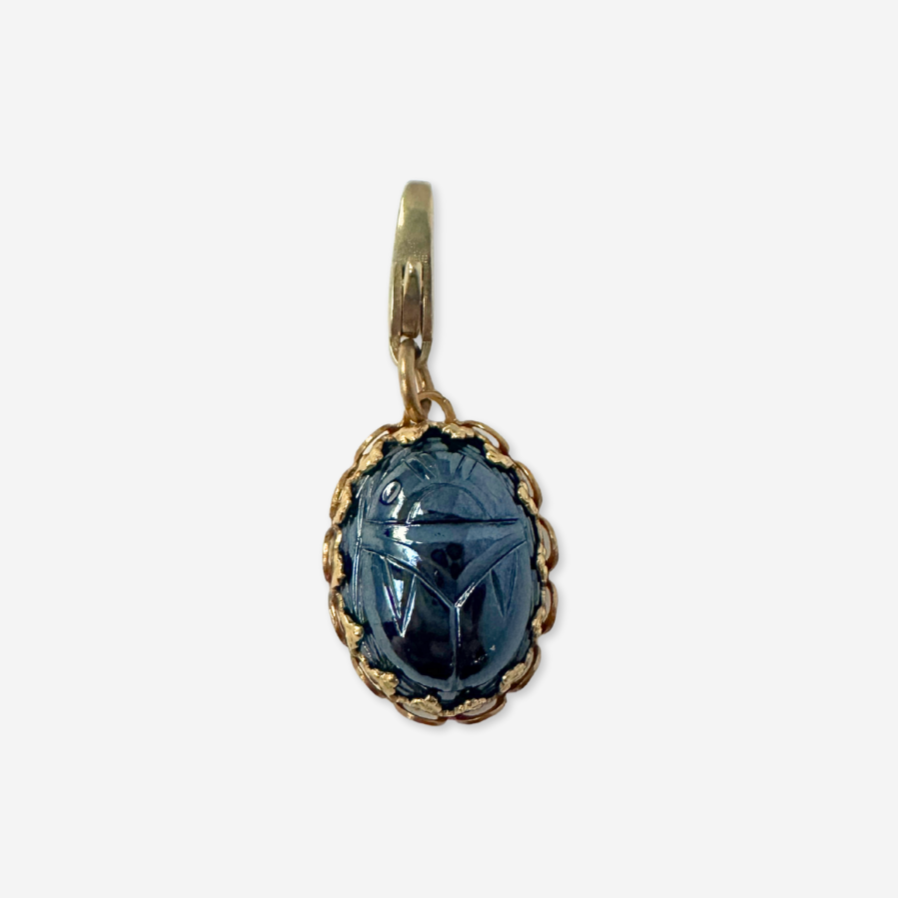 Vintage carved hematite scarab charm in brass setting