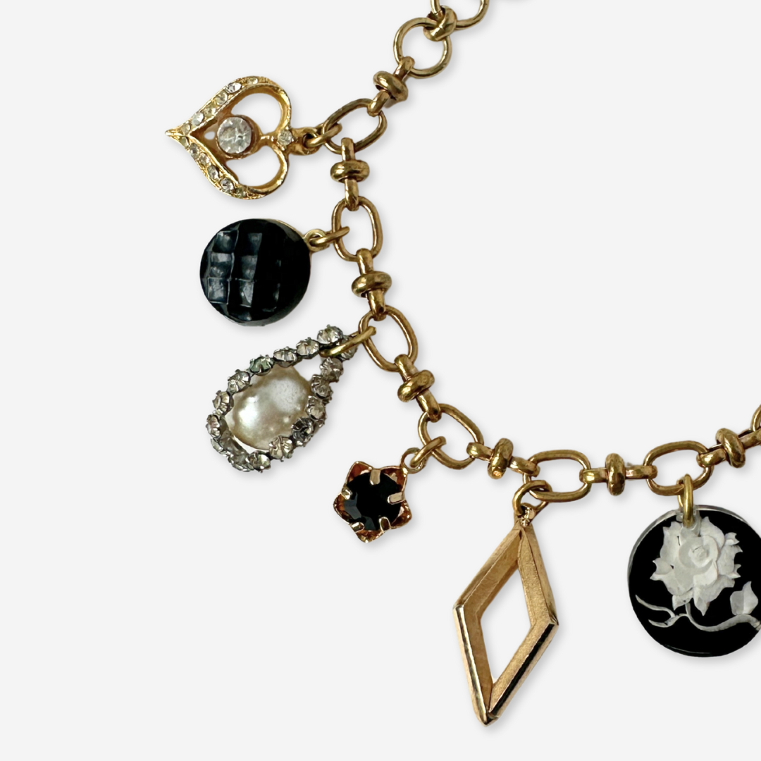 Repurposed vintage mixed charm bracelet