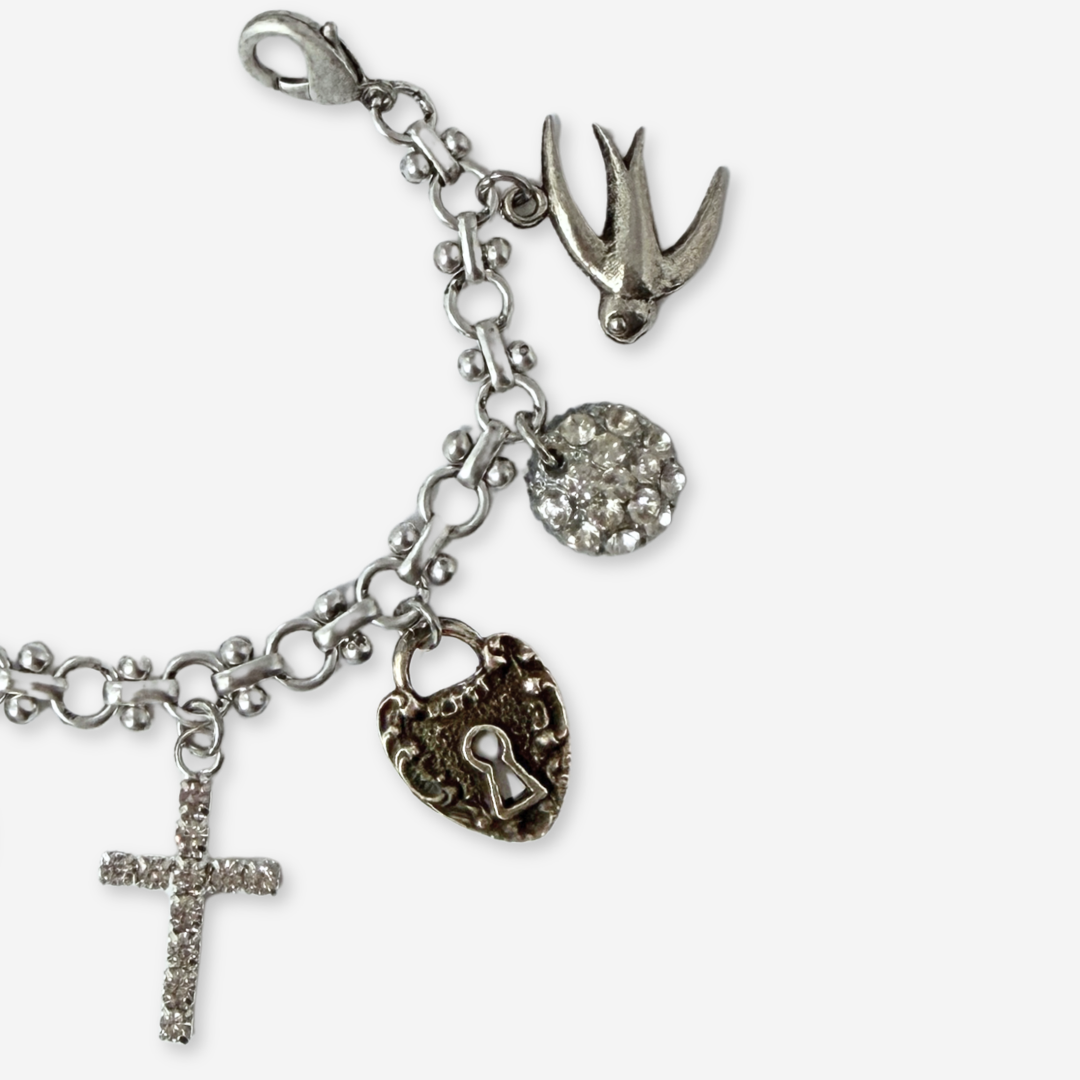 Repurposed vintage mixed silver religious charm bracelet