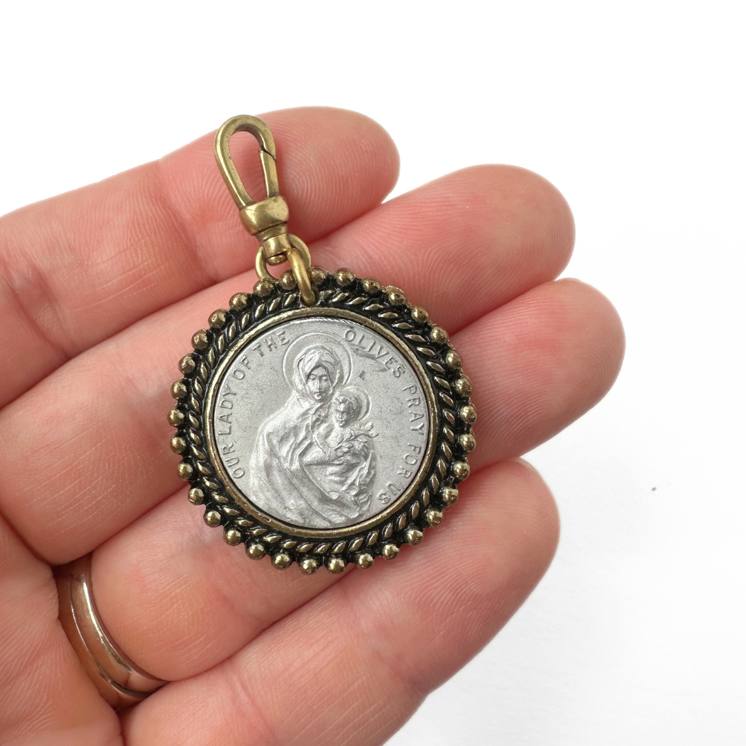 Largeb vintage mixed metal "Our Lady of Lourdes" circular medallion charm