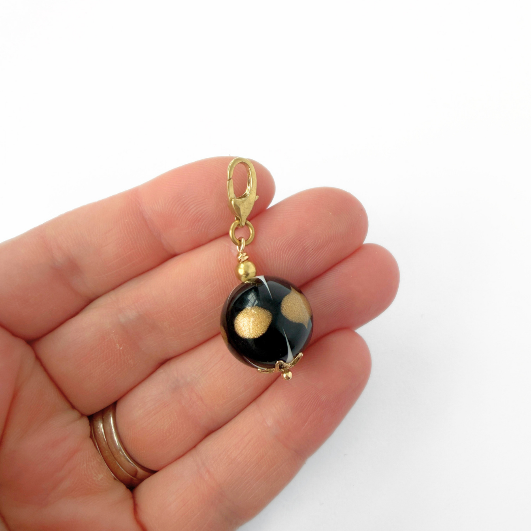 Vintage black, gold and white unique bead charm