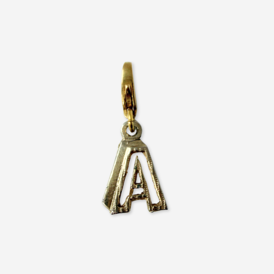 Small vintage gold tone cutout "A" monogram charm