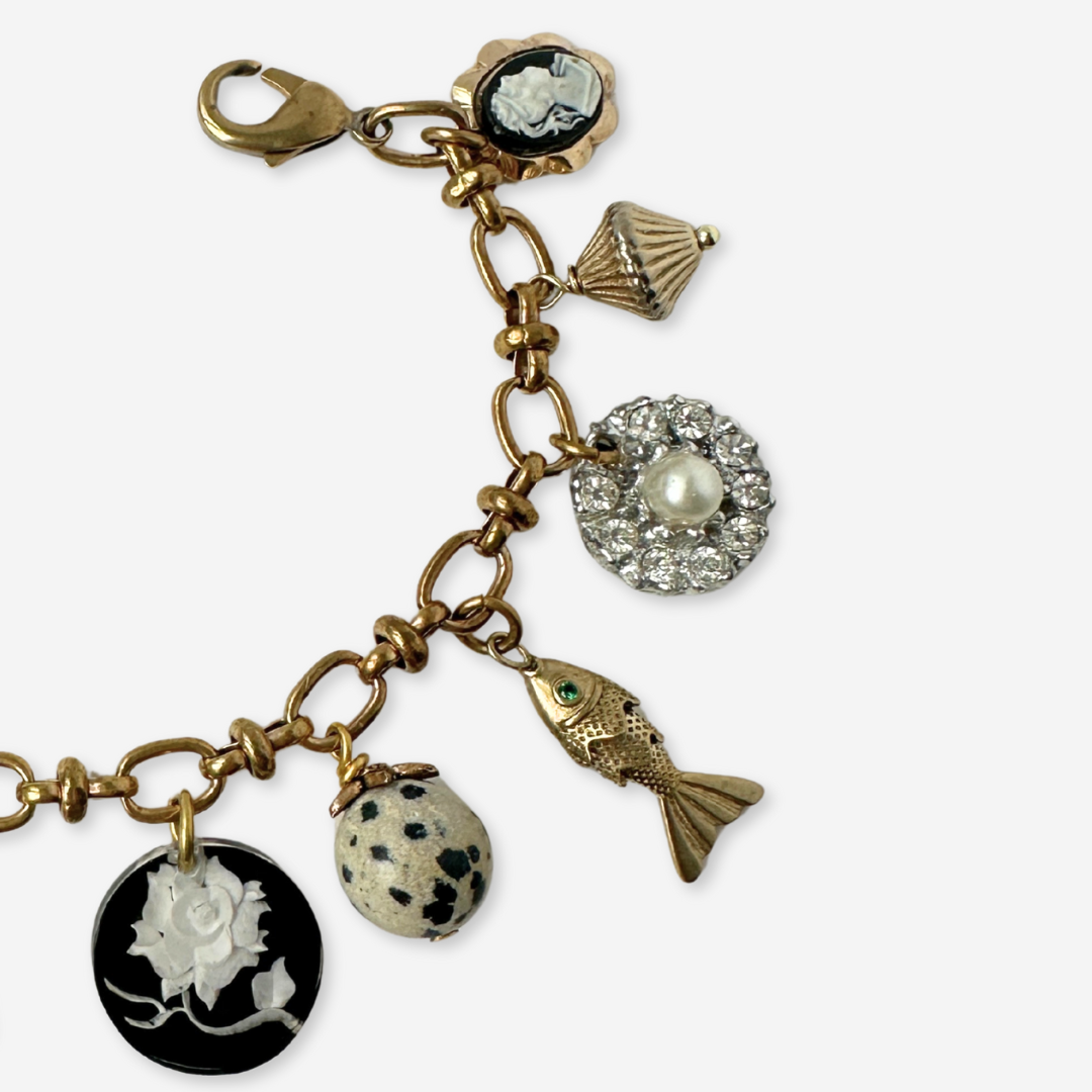 Repurposed vintage mixed charm bracelet