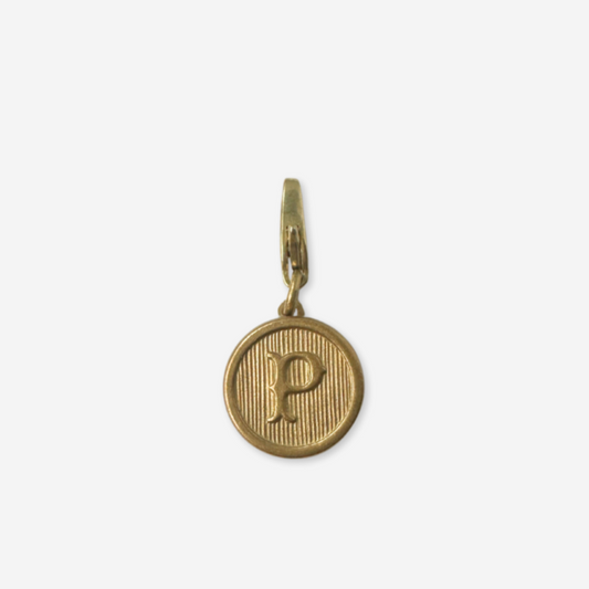 Small circular gold tone letter "P" charm
