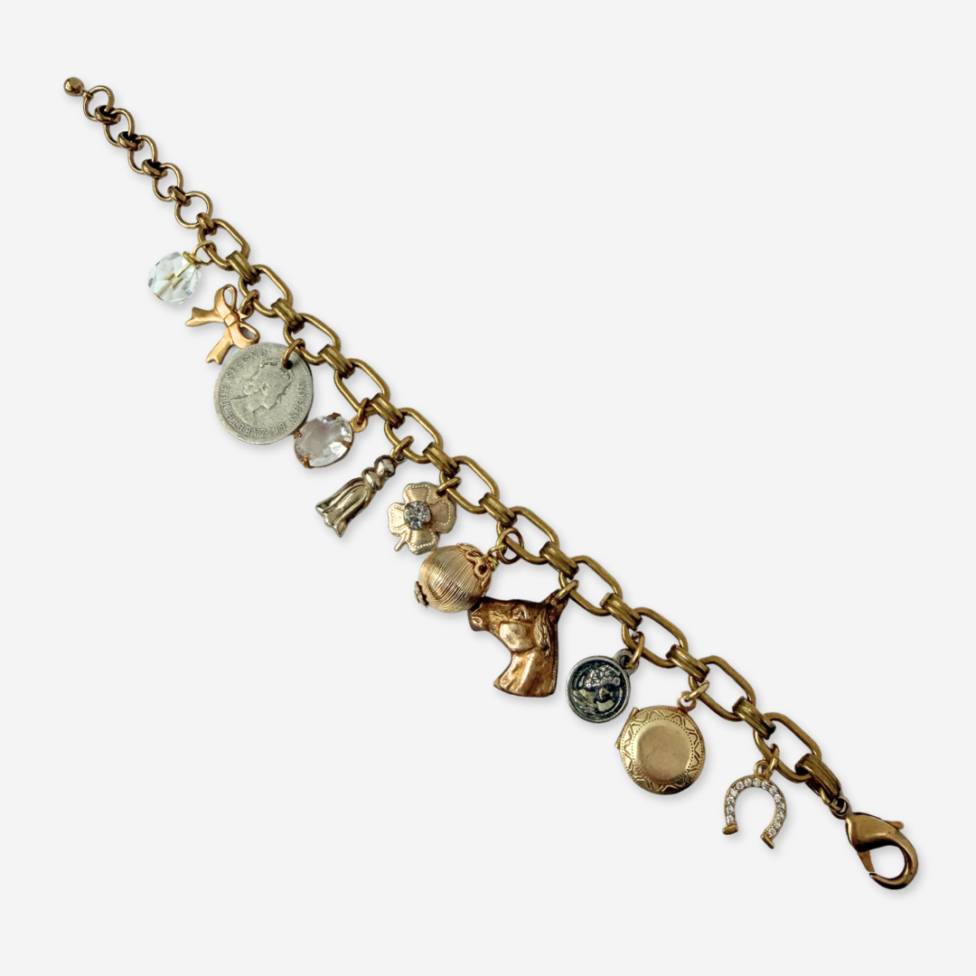 Repurposed vintage mixed neutral charm bracelet