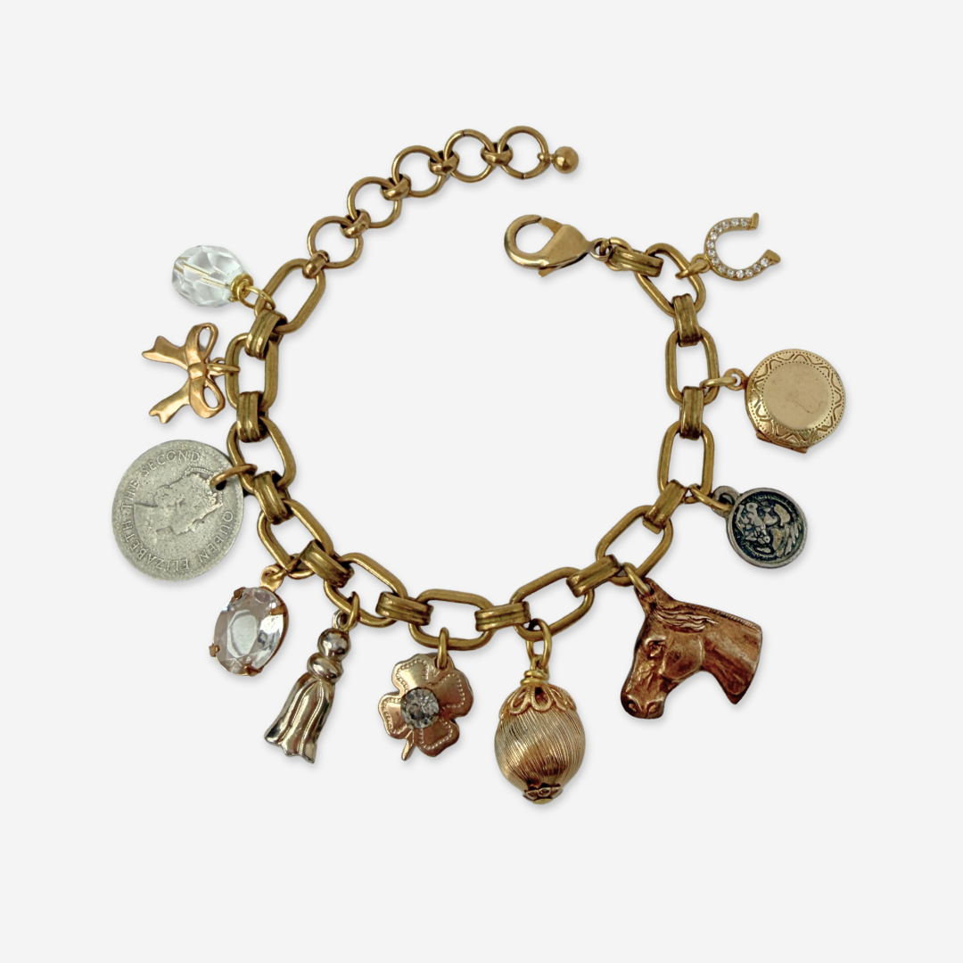 Repurposed vintage mixed neutral charm bracelet