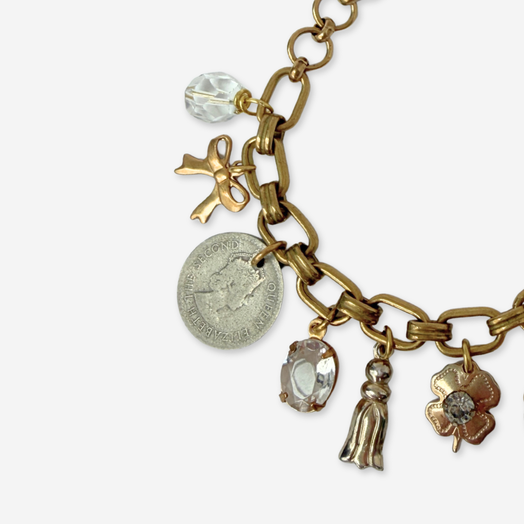 Repurposed vintage mixed neutral charm bracelet
