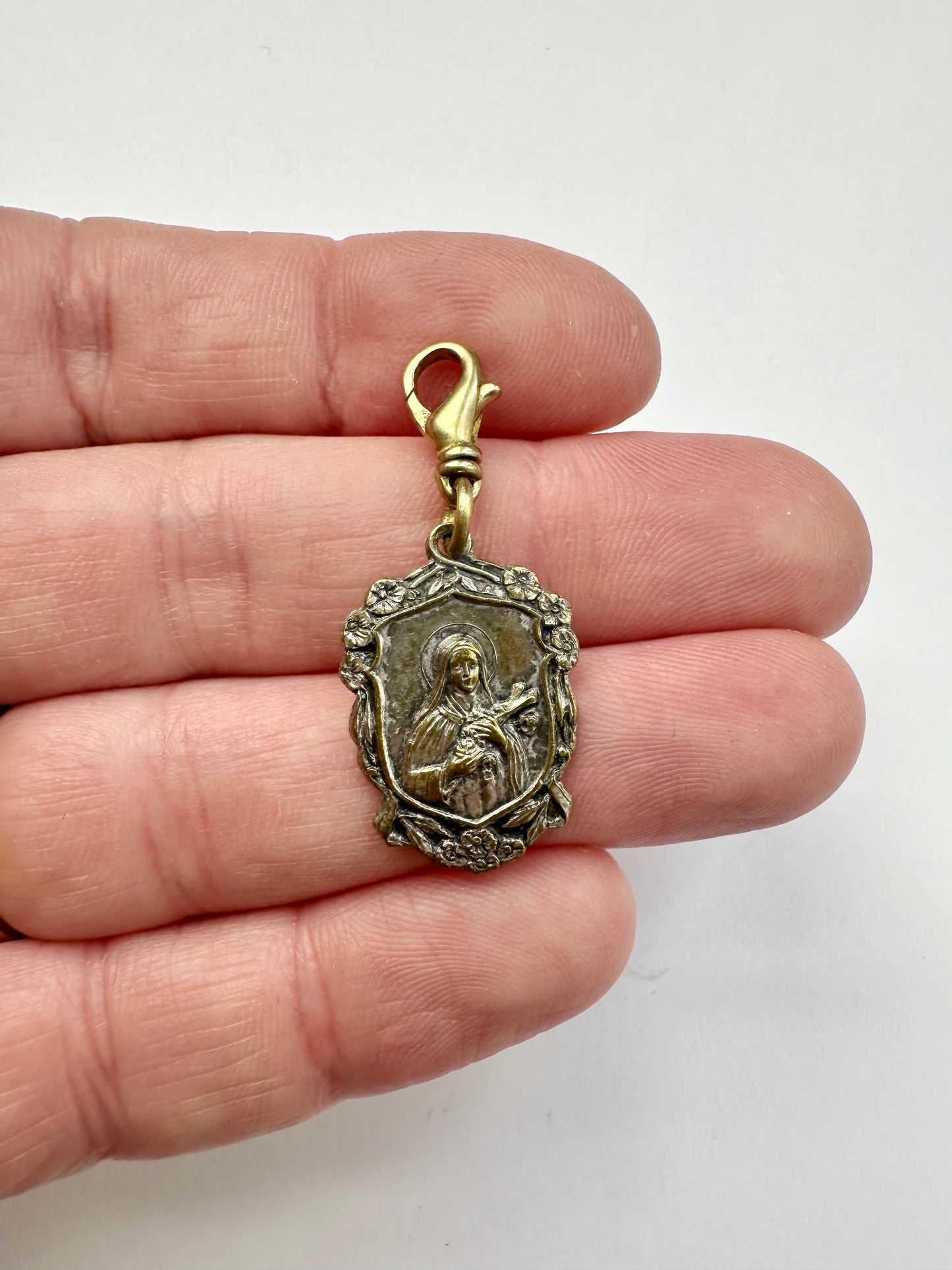 Vintage St. Therese religious medallion charm with brass swivel clasp