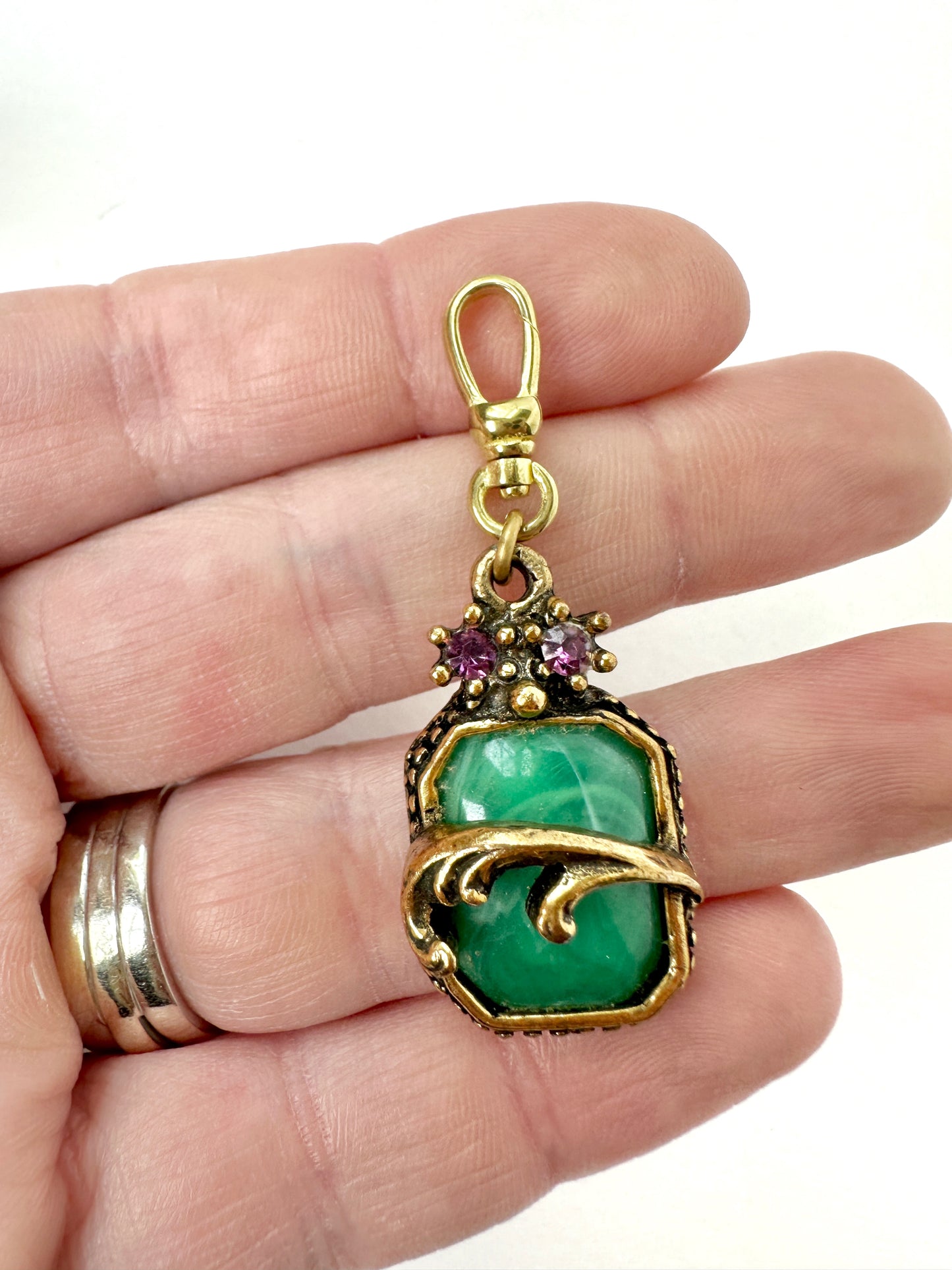 Vintage green cabochon charm in antique brass setting