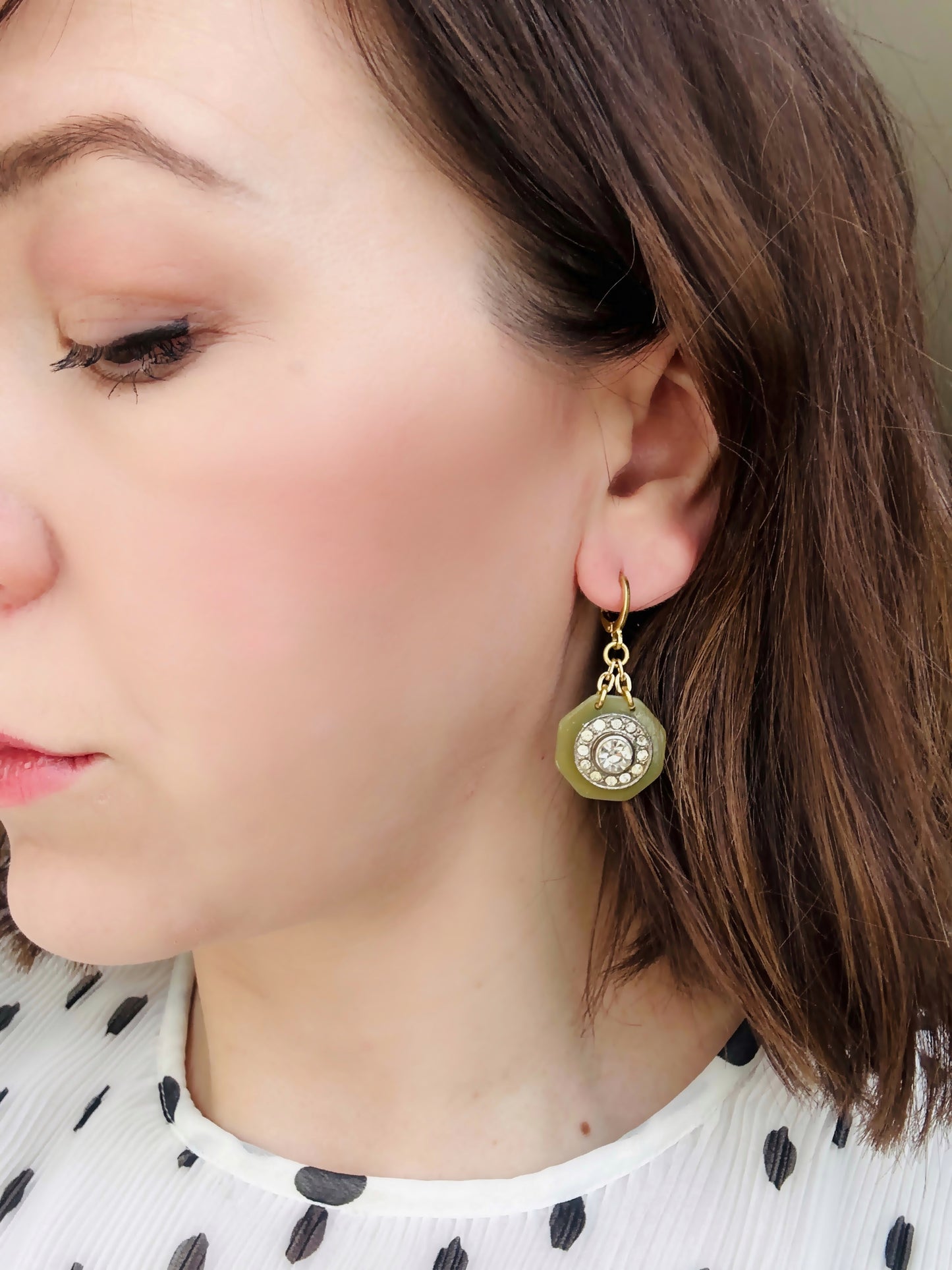 Repurposed vintage olive green button earrings with clear rhinestone centers and brass lever backs