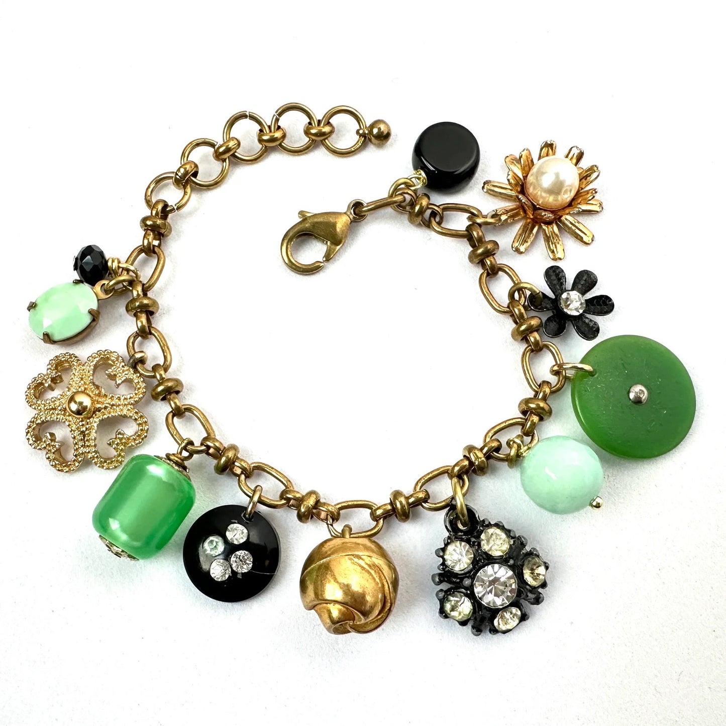 Repurposed vintage charm bracelet on brass chain