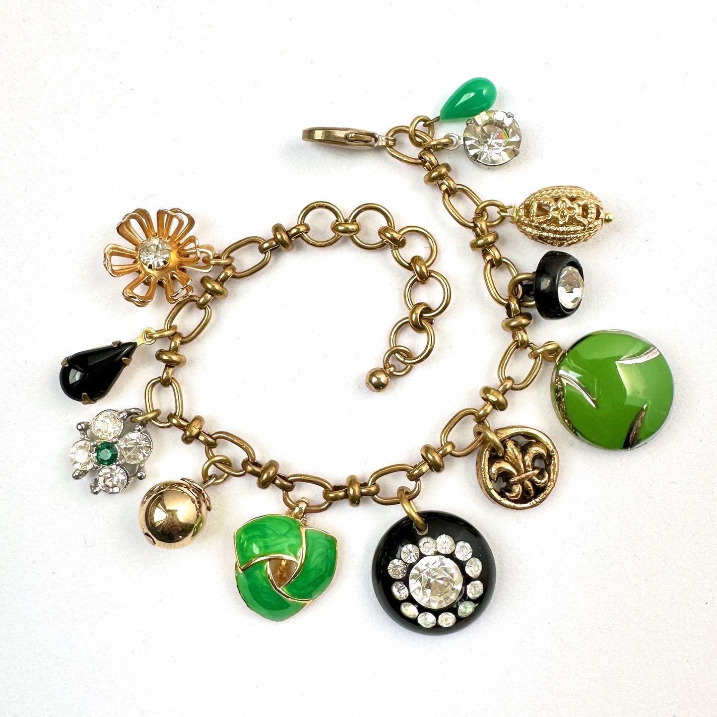 Repurposed vintage charm bracelet on brass chain