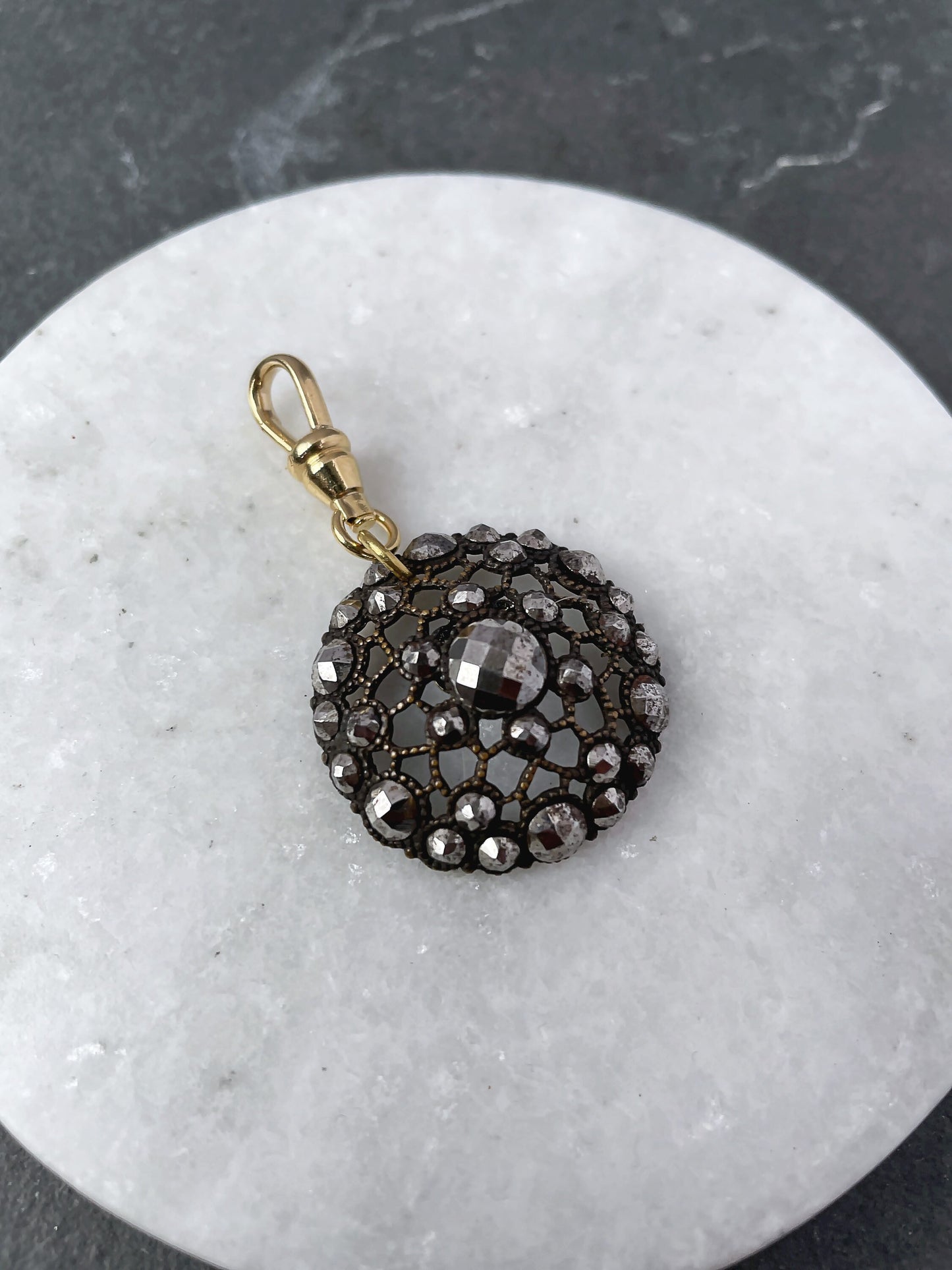 Refashioned French steel cut button charm with gold plated swivel clasp