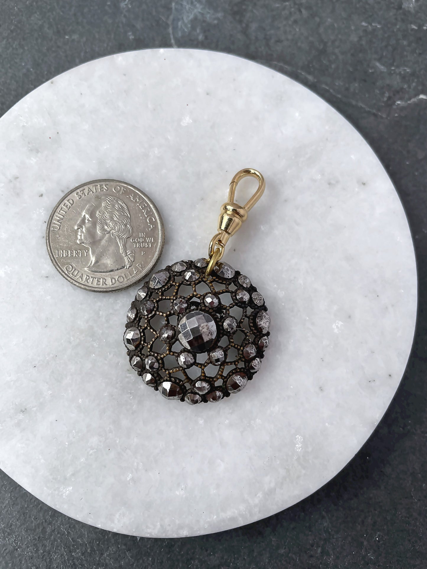 Refashioned French steel cut button charm with gold plated swivel clasp