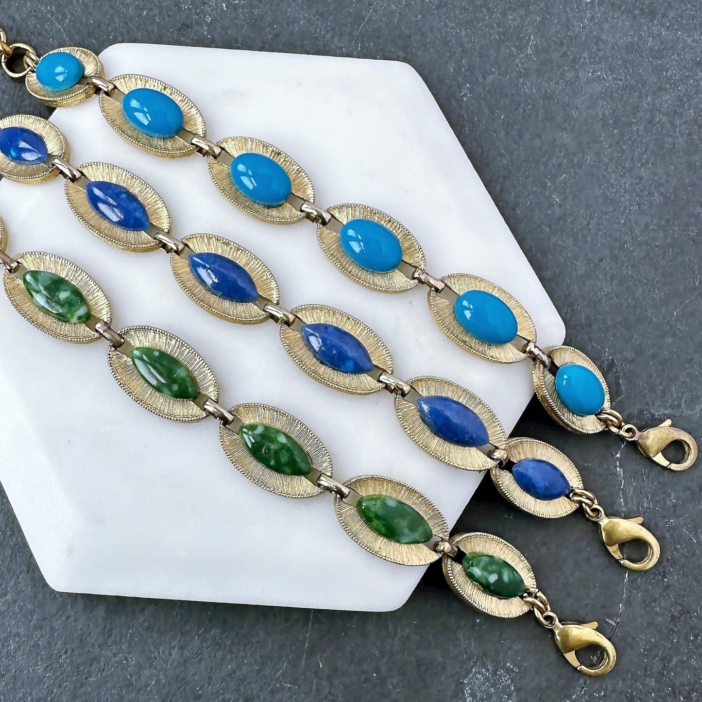 Refashioned vintage gold tone oval link bracelet with green or blue acrylic cabochons