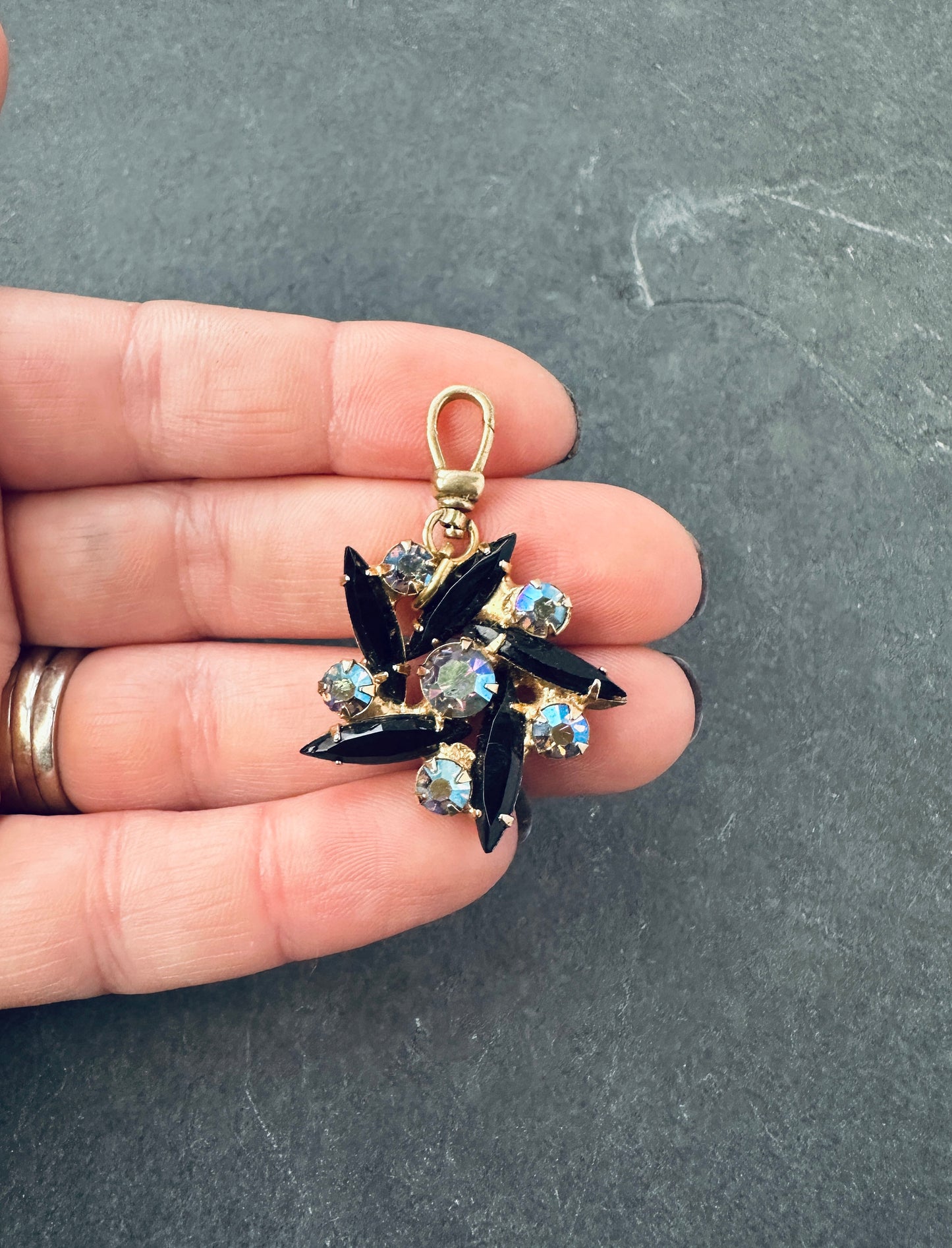 Vintage black and iridescent charm with raw brass swivel clasp